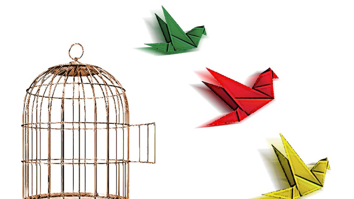 Bird cage on a round table and a black bird flying away. Vintage engraving stylized drawing. Vector illustration