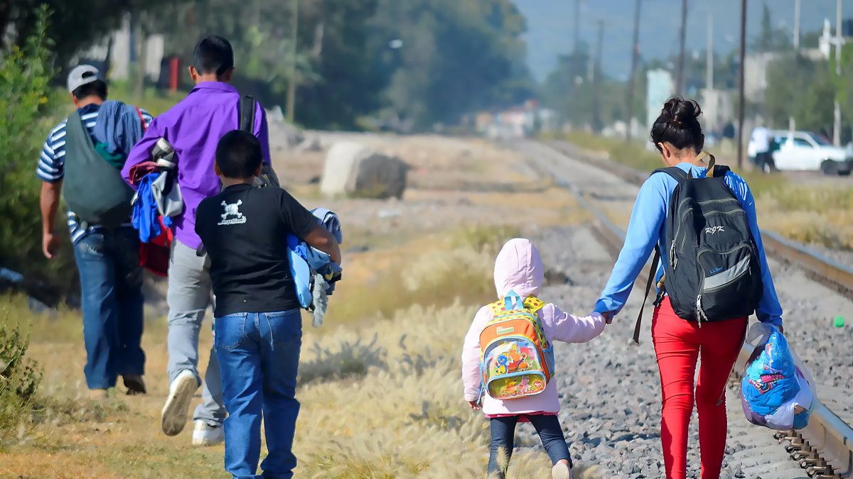 Imagen de archivo de personas migrantes