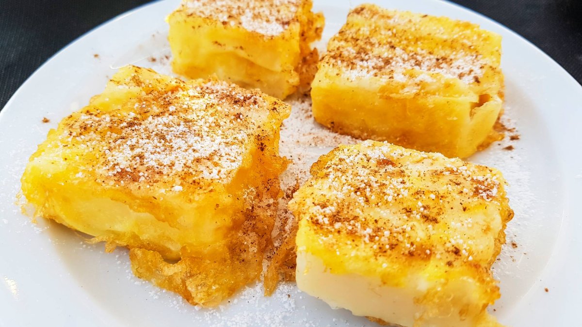 La textura cremosa de la leche frita contrasta con su exterior dorado, una de las claves de este dulce tradicional de Semana Santa