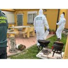 Agentes en la vivienda donde se registraron las agresiones.