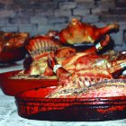 Asados de lechal en horno de leña
