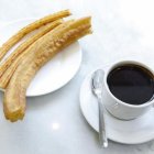 Imagen de archivo de un chocolate con churros.